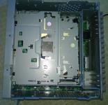 The top of the unit with the cover removed showing the CD drive.