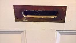 The inserted stop for the mail slot.