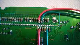 Soldered leads to the bottom of the stereo board.
